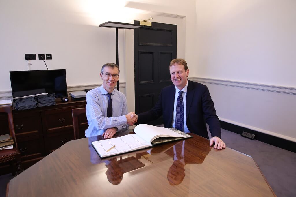 Signing the register of members for the 34th Dail